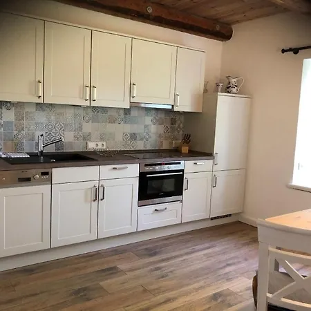 Reetdachhaus Ruexbuell *